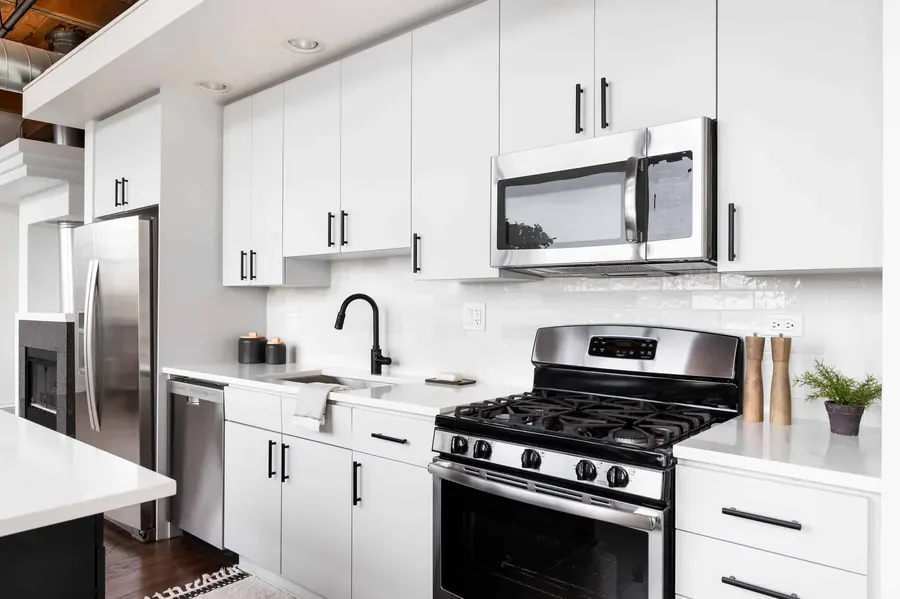 White kitchen with freshly painted cabinets